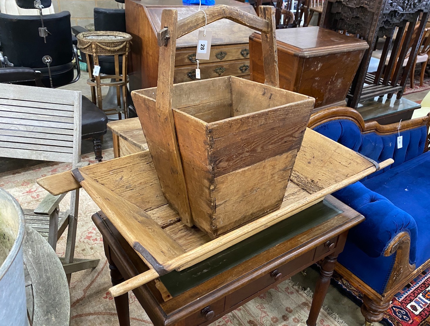 A 19th century iron bound rectangular pine dough bin, width 104cm, depth 49cm together with a square pine bucket, height 58cm